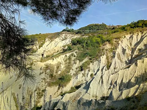 The clay walls of the Calanchi Reserve
